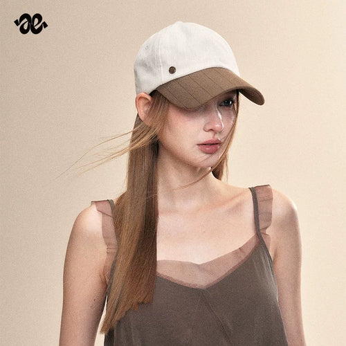 Amoge contrasting color high-end baseball cap for women 2026 new four seasons fashion simple sunshade and sun protection peaked cap